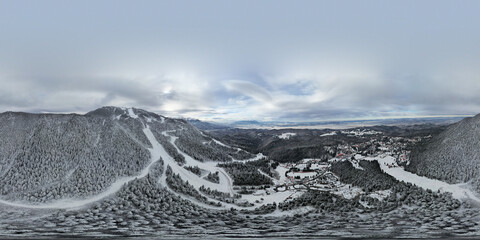 Winter ski resort, ski slope, lift cabins and gondola of aerial view	