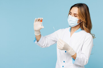 Female doctor woman wears white medical gown suit mask gloves work in hospital clinic office do...