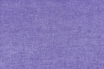 Textile background, purple coarse fabric texture, cloth structure close up, jacquard woven...