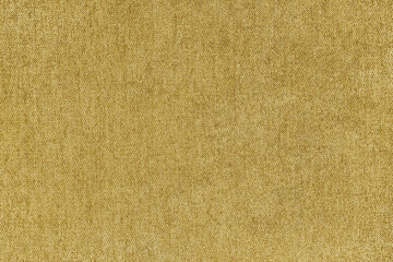 Texture background of velours jacquard yellow fabric. Upholstery texture fabric, velvet furniture...
