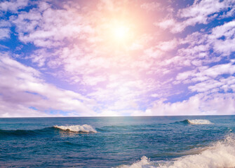 Sea tropical beach and sun on blue sky.