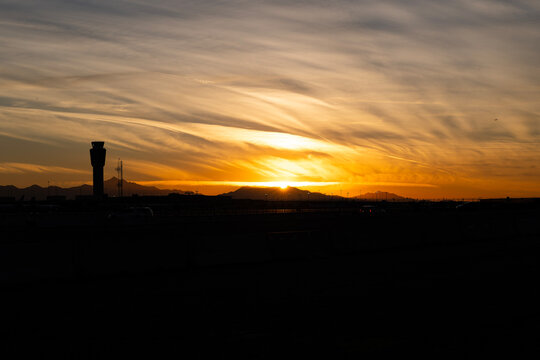 Phoenix Sky Harbor Airport 1-13-2024 Phoenix, AZ USA ..Spectacular winter desert sunset at Sky Harbor Airport