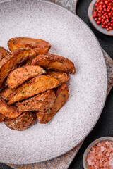 Delicious crispy potato wedges with garlic, salt, spices and herbs