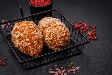 Muurstickers Delicious fresh cutlet or meatball Kiev style with filling © chernikovatv