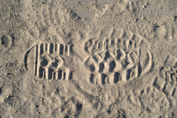 boots footprint on sand