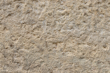 Old stone texture. Beige natural stone texture. Rocks background.