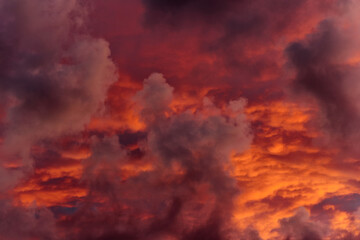 an extraordinary mesmerizing view of the gloomy fiery sky at dawn