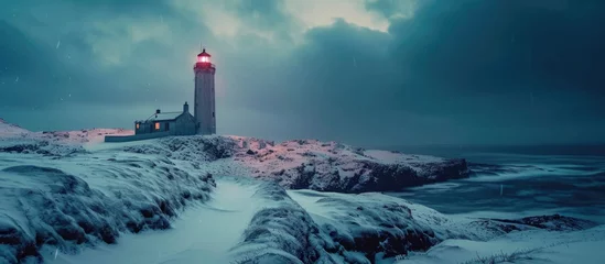 Foto auf Acrylglas Kirkjufell Icelandic winter at Svoruloft Lighthouse.
