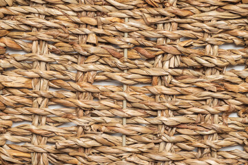Storage basket woven from seagrass as background