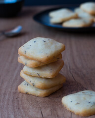 Crackers stacked on wooden table