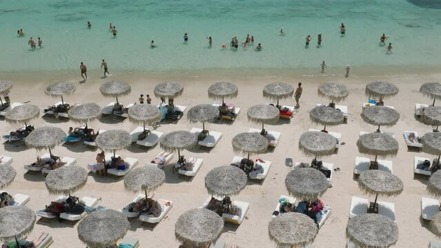 Beach full of people having fun in Paros