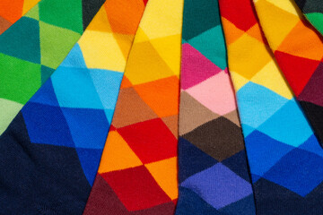 Arrangement of pastel color socks with an argyle pattern