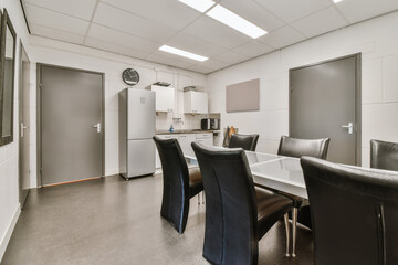 Modern office break room interior with furniture