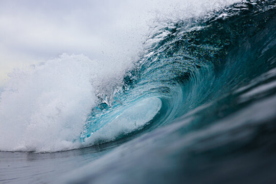Powerful Ocean Wave Cresting with Spray