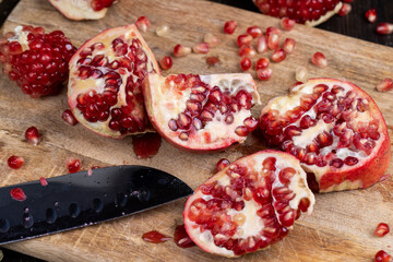 red ripe pomegranate with red grains