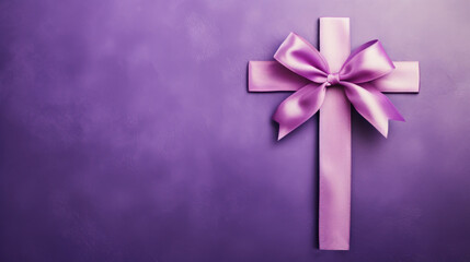 Purple cross adorned with a ribbon against a textured purple backdrop