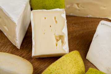 cheese with white mold cut into chunks