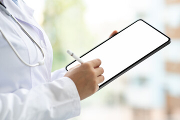 Doctor hands using digital tablet with white screen