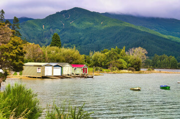 Colourful boat houses on the shore of Queen Charlotte Sound, Marlborough Sounds, South Island, New...