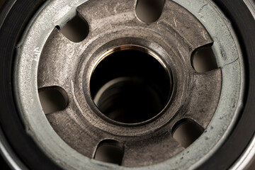 new oil filter for cleaning the oil in the car engine
