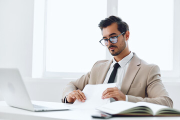 Fototapeta premium Planning paper workplace holding document laptop businessman attractive office happy company suit