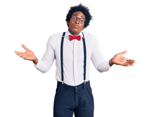 Handsome african american man with afro hair wearing hipster elegant look clueless and confused expression with arms and hands raised. doubt concept.