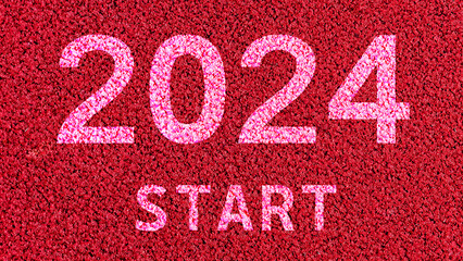 New year 2024 concept, beginning of success, Text 2024 written on asphalt road preparing for the new year. Concept of challenge or career path and change, start 2024 annual business plan.