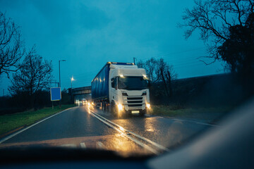 Lorry driving on a British road 