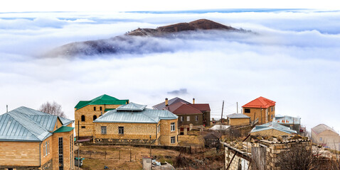 The famous high mountain village of Kubachi in Dagestan above the clouds