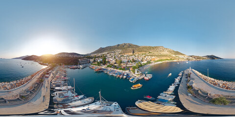 Aerial panoramic view of the pier and the city of Kalkan, Antalya province, Turkey at sunset. Seamless 360 degree spherical panorama © Sergey Chips