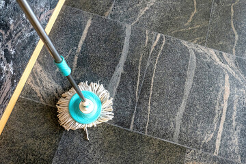 Mop for washing floors. House cleaning equipment. Mop for washing tiles. Brush for cleanup dust....