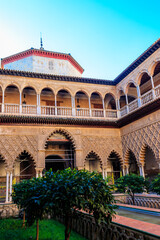 Obraz premium Patio de las Doncellas in Royal palace, Real Alcazar (built in 1360) in Seville, Andalusia, Spain. Real Alcazar is iconic and famous Moorish royal palace