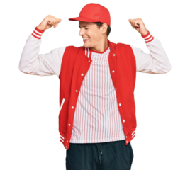 Handsome caucasian man wearing baseball uniform showing arms muscles smiling proud. fitness concept.