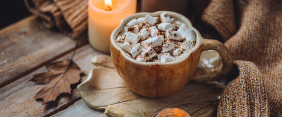 Spicy sweet fall hot drink: delicious pumpkin latte with cinnamon, marshmallow with salted caramel....