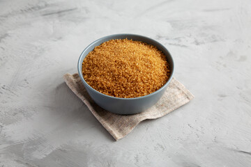 Organic Brown Sugar in a Bowl, side view.