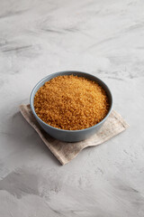 Organic Brown Sugar in a Bowl, side view.