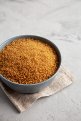 Organic Brown Sugar in a Bowl, side view.