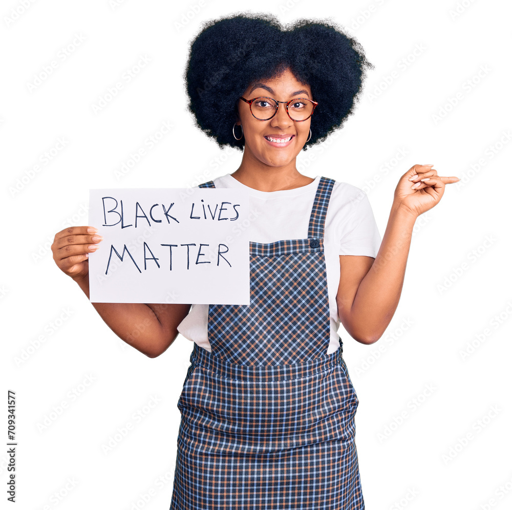 Sticker young african american girl holding black lives matter banner smiling happy pointing with hand and f