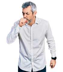 Middle age hispanic with grey hair wearing casual white shirt feeling unwell and coughing as symptom for cold or bronchitis. health care concept.