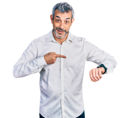 Middle age hispanic with grey hair wearing casual white shirt in hurry pointing to watch time, impatience, upset and angry for deadline delay