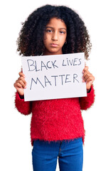 African american child with curly hair holding black lives matter banner thinking attitude and...
