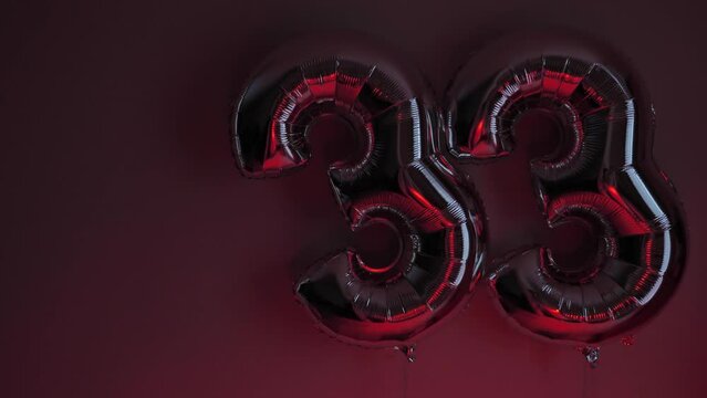 Party Happy Birthday Thirty-Three with Silver Grey number . Gel balls 33 for congratulations celebrations holiday. Close-up, neon lighting, no people