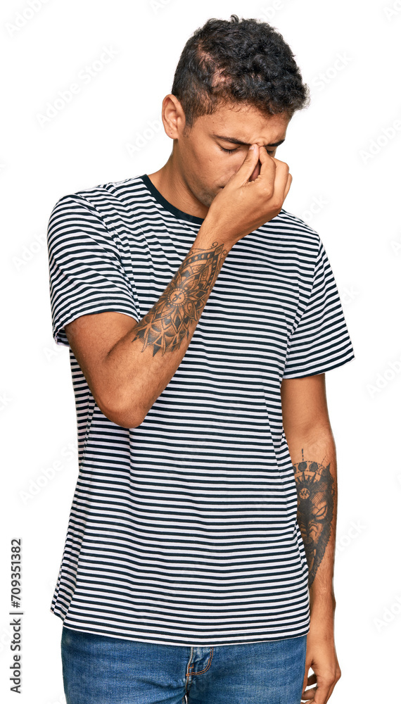 Poster young handsome african american man wearing casual clothes tired rubbing nose and eyes feeling fatig