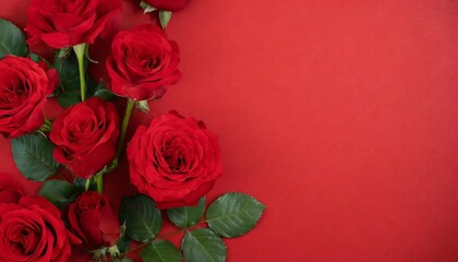 red roses flower on red background copy space flower frame top view high quality photo