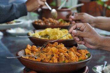 Various kinds of menus are served in buffet manner which is usually at a meeting, party, wedding or family gathering. Traditional culinary like chicken, fish, tempeh, tofu, potato, vegetable and egg.
