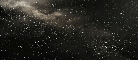 Fototapeta premium Small white specks punctuate the vast black canvas for banner design.