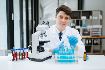 Modern medical research laboratory. female scientist working with micro pipettes analyzing...