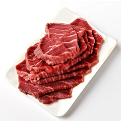 Thin slices of raw beef on a white rectangular plate