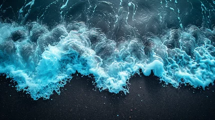 Fotobehang Crystal clear blue ocean waves on a black beach. Colorful contrasting surf © NeuroSky