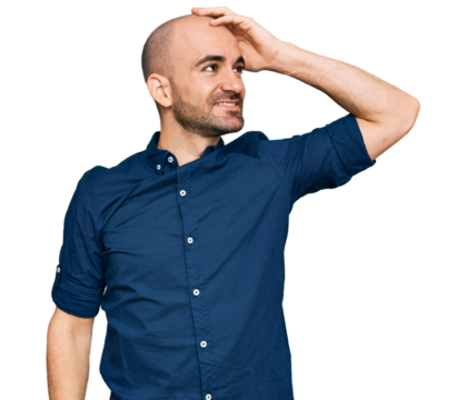 Young hispanic man wearing casual clothes smiling confident touching hair with hand up gesture, posing attractive and fashionable